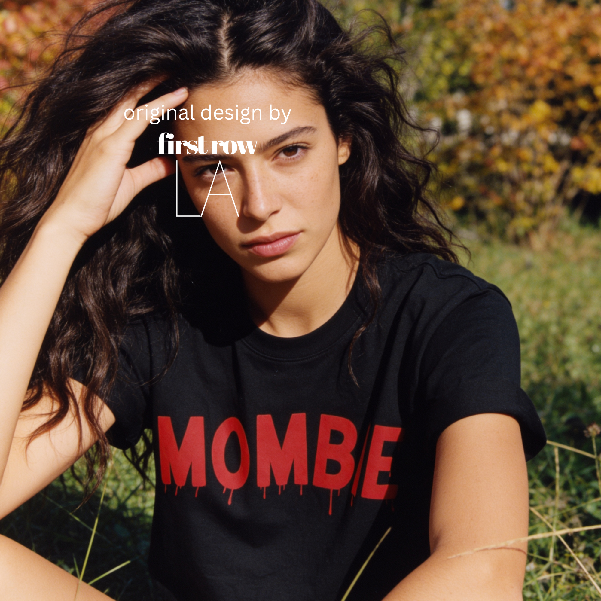 Woman wearing Mombie T-shirt. Fun zombie halloween shirt.

Original design and copyright by first row LA.