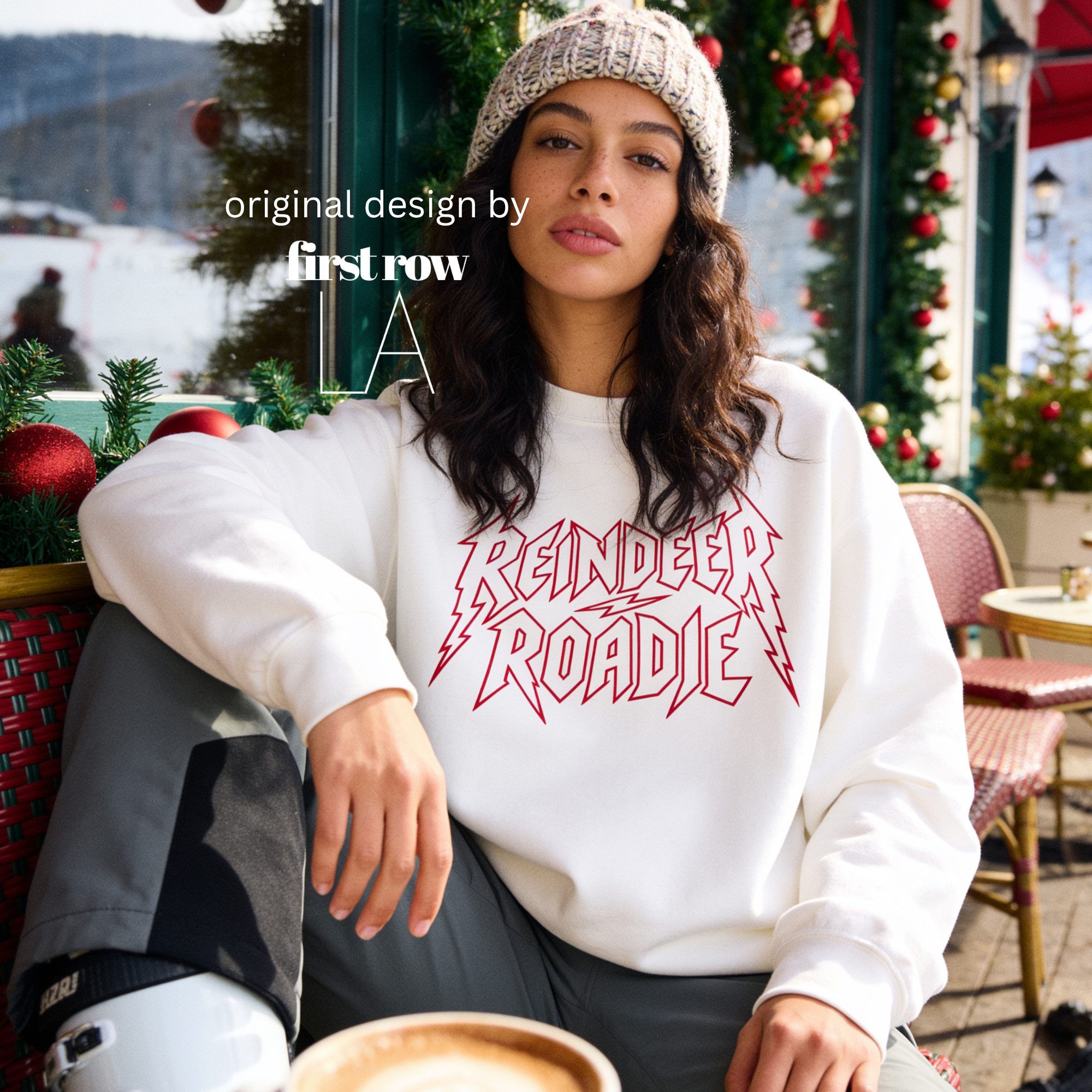 A woman wearing 'Reindeer Roadie' unisex Christmas sweatshirt.

Original design and copyright by first row LA.