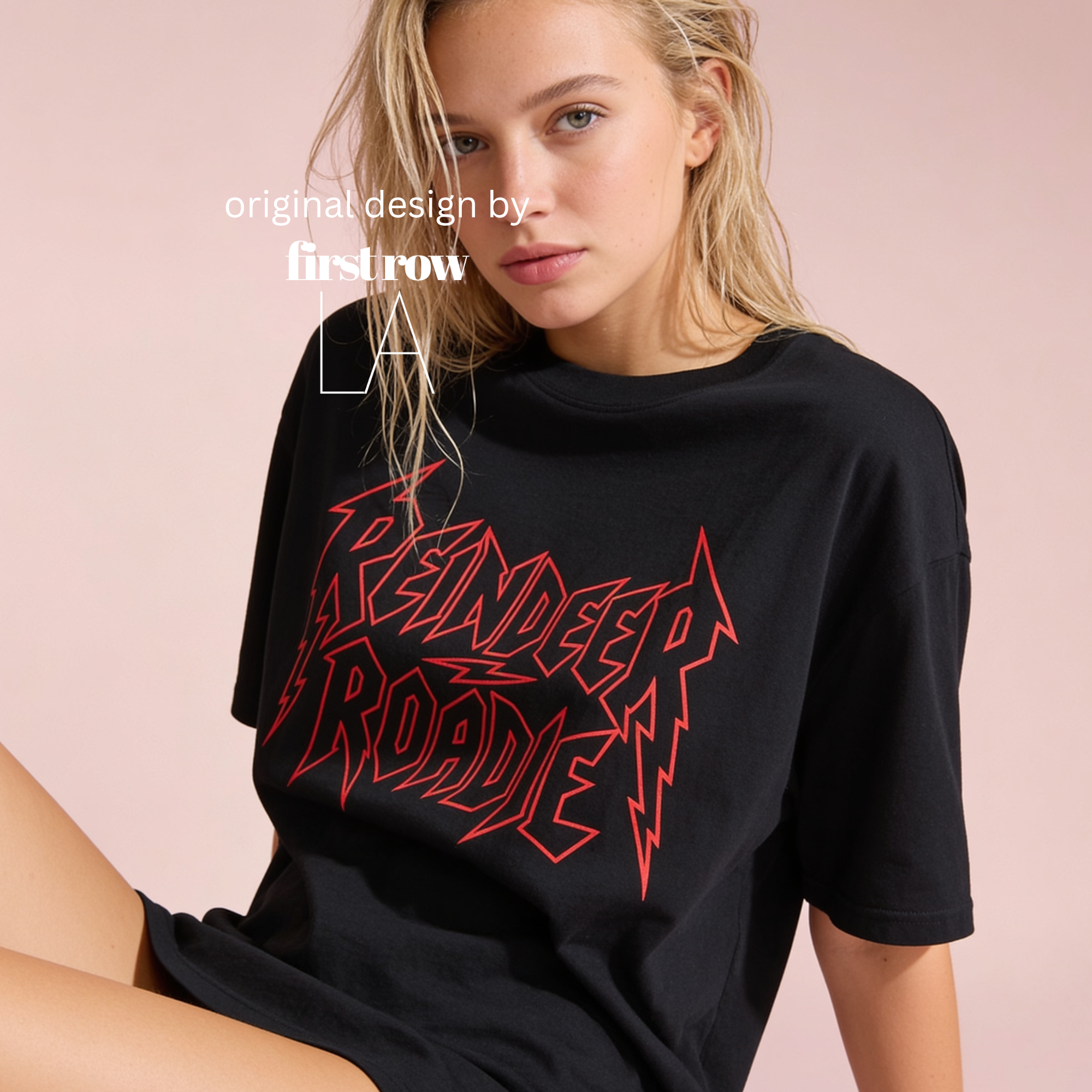 Woman wearing unisex 'REINDEER ROADIE' T-shirt. 

Original design and copyright by first row LA.