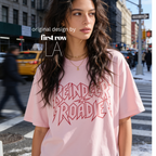 Woman wearing unisex 'REINDEER ROADIE' T-shirt. 

Original design and copyright by first row LA.