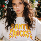 Woman wearing 'Santa Rocks' unisex sweatshirt. 

Original design and copyright by first row LA.