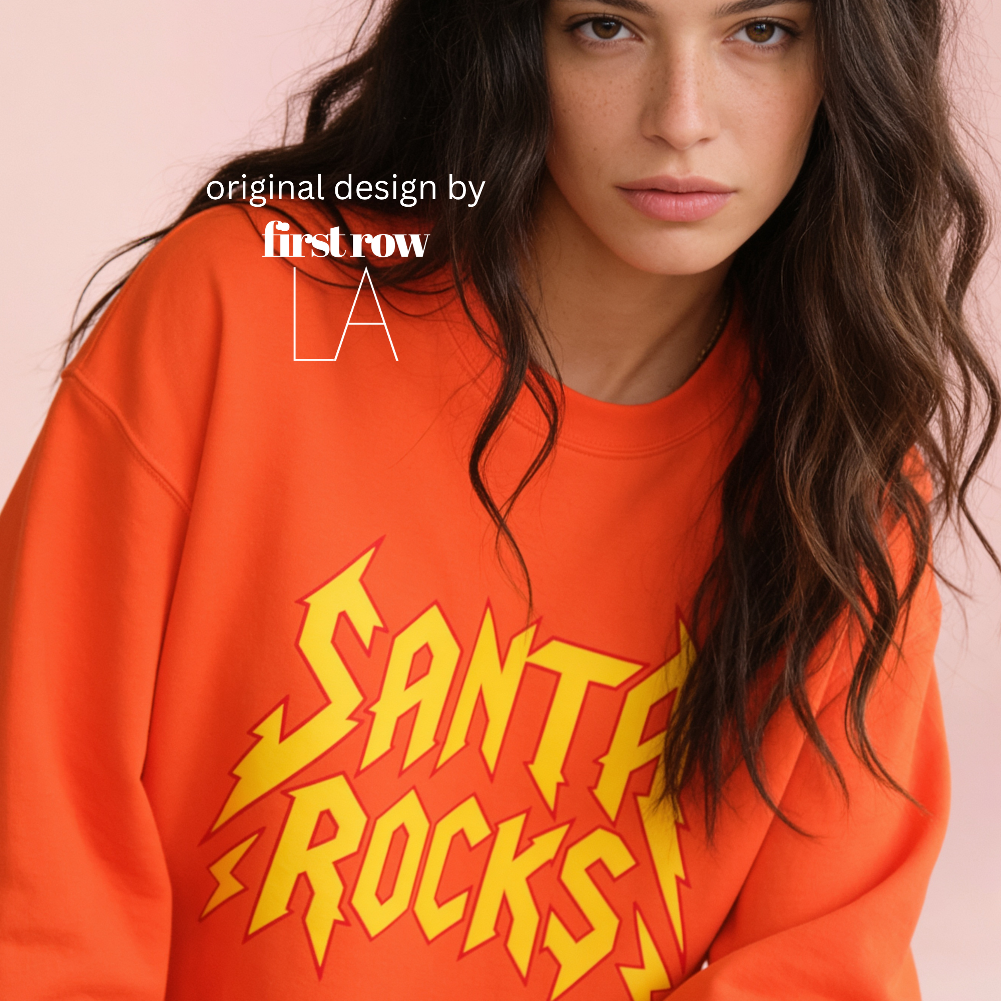 Woman wearing 'Santa Rocks' unisex sweatshirt. 

Original design and copyright by first row LA.