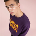 Man wearing 'Santa Rocks' unisex sweatshirt. 

Original design and copyright by first row LA.