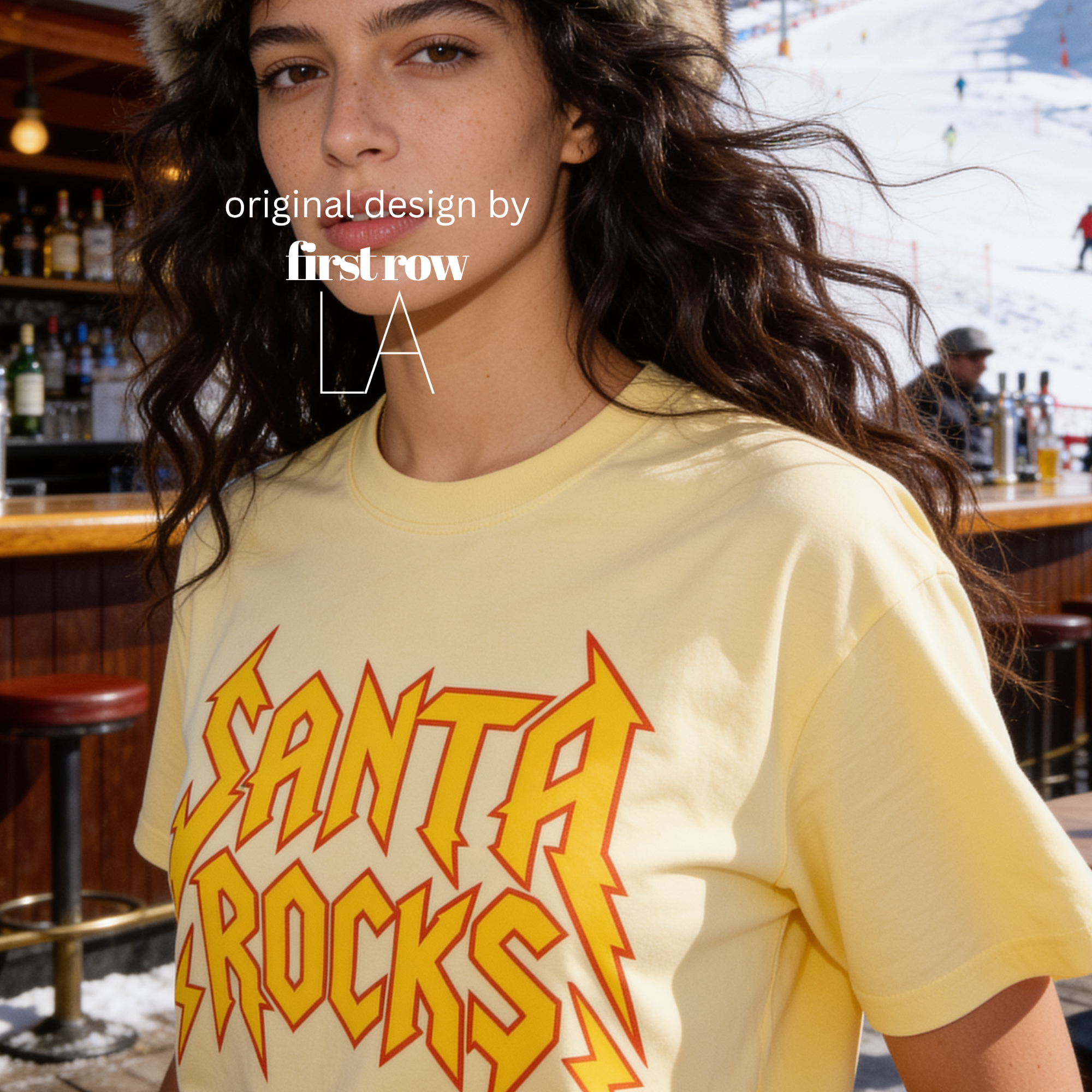 A woman wearing 'SANTA ROCKS' unisex funny Christmas T-shirt.

Original design and copyright by first row LA.