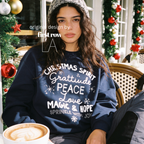 A woman wearing 'CHRISTMAS SPIRIT Gratitude PEACE Love MAGIC & HOPE Sprinkle with Joy' unisex sweatshirt.

Original design and copyright by first row LA August 10th, 2026.