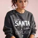 A woman wearing crewneck sweatshirt with the text 'Dear SANTA I can EXPLAIN'.

Original design and copyright by first row LA, August 10th 2026.