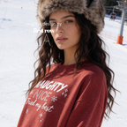 A woman wearing a crewneck sweatshirt with the text 'NAUGHTY, NICE - Tried my best'.

Original design and copyright by first row LA, August 11th 2026.