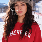 A woman wearing a bright pink crewneck sweatshirt with 'MERRIER' printed in white arched letters across the chest.

Original design and copyright by first row LA, August 11th 2026.