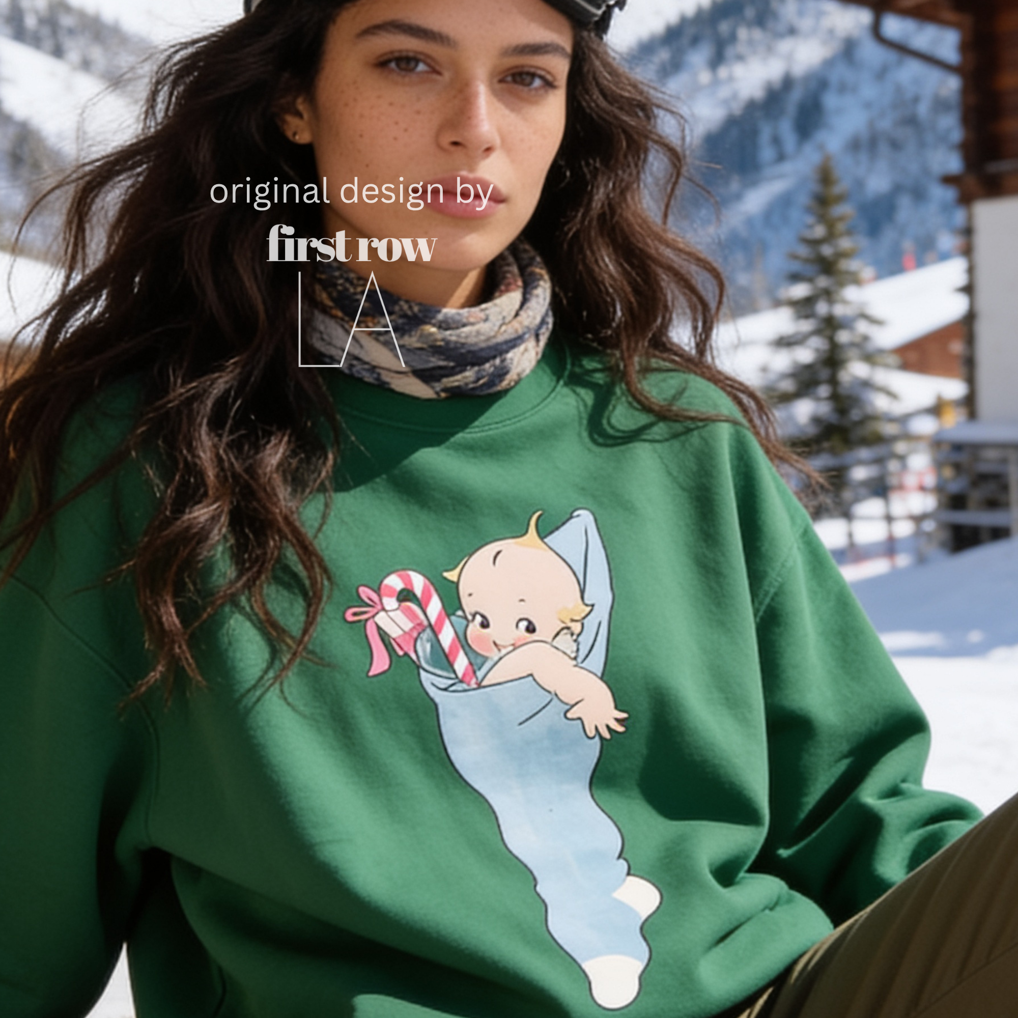A woman wearing a Christmas sweatshirt with a Kewpie cartoon baby graphic.

Original design and copyright by first row LA, august 12th 2026.