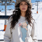 A woman wearing a Christmas sweatshirt with a Kewpie cartoon baby graphic.

Original design and copyright by first row LA, august 12th 2026.