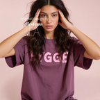 Woman wearing HYGGE T-shirt  with  large pink hand drawn letters.

Original design and copyright by first row LA Aught 18th, 2026.