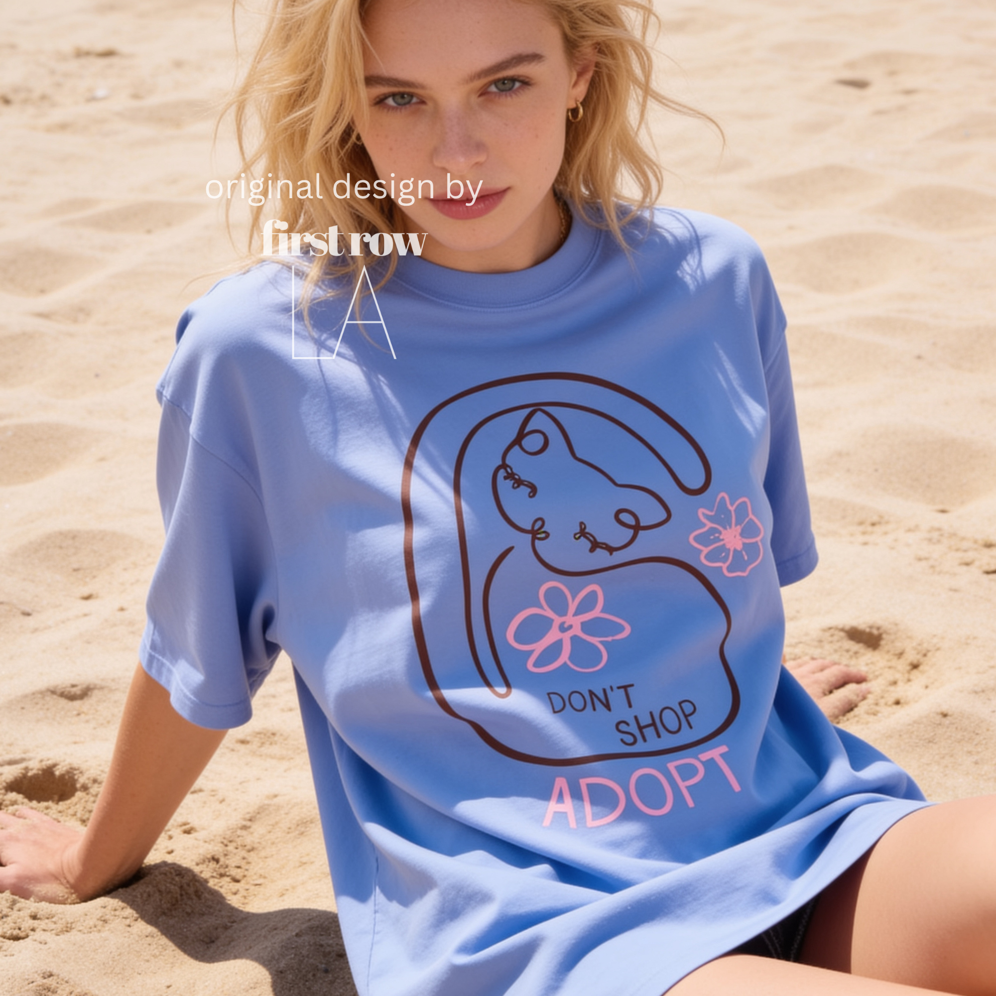 A woman wearing a graphic T-shirt with a cat illustration and the words 'DON'T SHOP ADOPT'.

Original design and copyright by first row LA 2021.