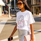 A woman wearing a graphic T-shirt with a cat illustration and the words 'DON'T SHOP ADOPT'.

Original design and copyright by first row LA 2021.