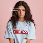 A woman wearing graphic t-shirt with the words 'PICK KINDNESS' and a strawberry illustration.

Original designs and copyright by first row LA 2025.