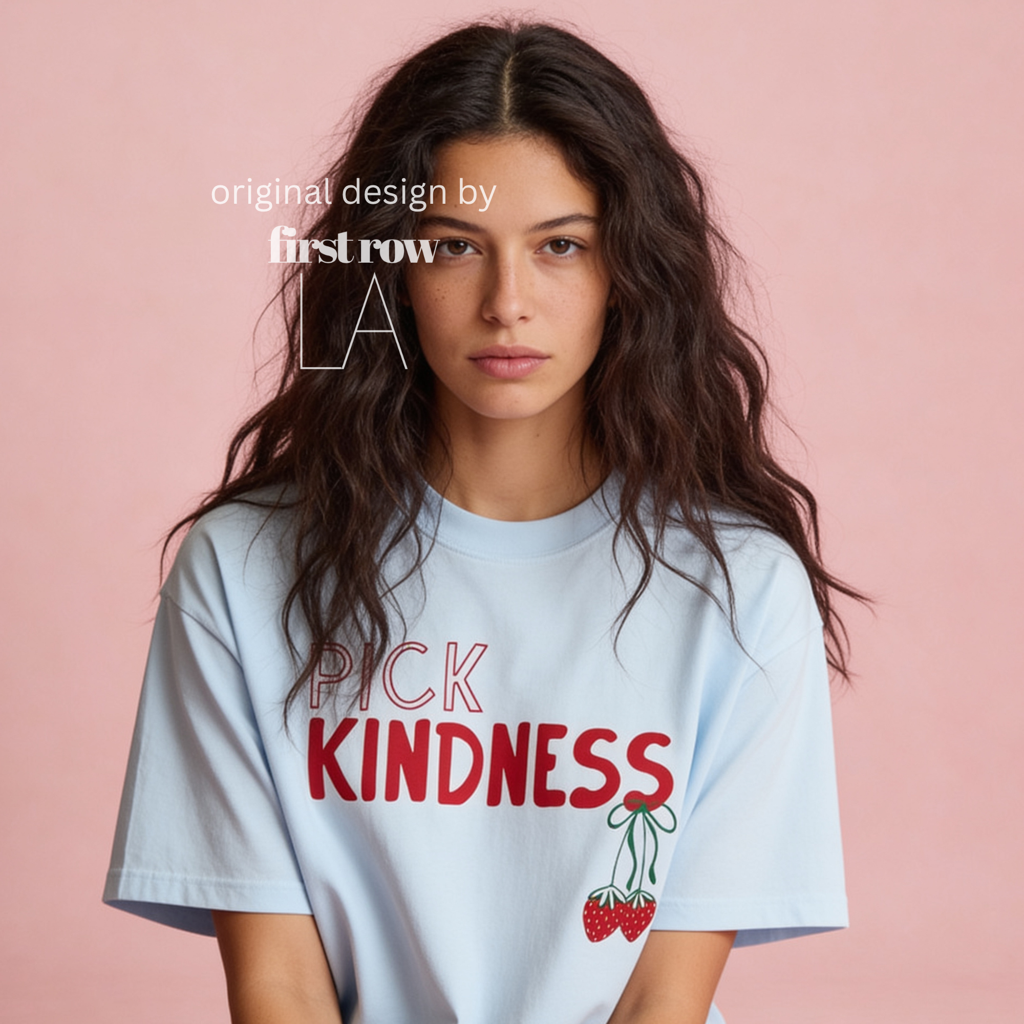 A woman wearing graphic t-shirt with the words 'PICK KINDNESS' and a strawberry illustration.

Original designs and copyright by first row LA 2025.