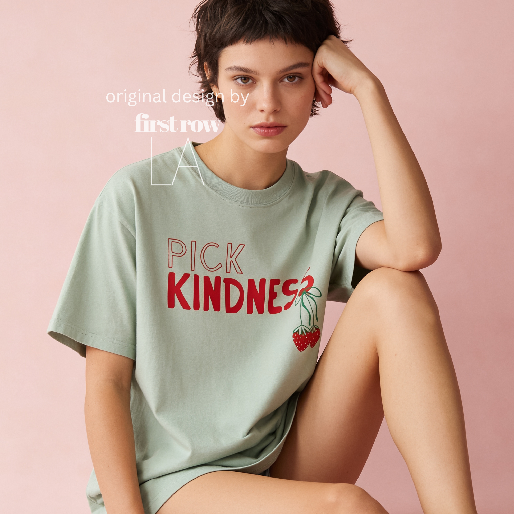 A woman wearing graphic t-shirt with the words 'PICK KINDNESS' and a strawberry illustration.

Original designs and copyright by first row LA 2025.