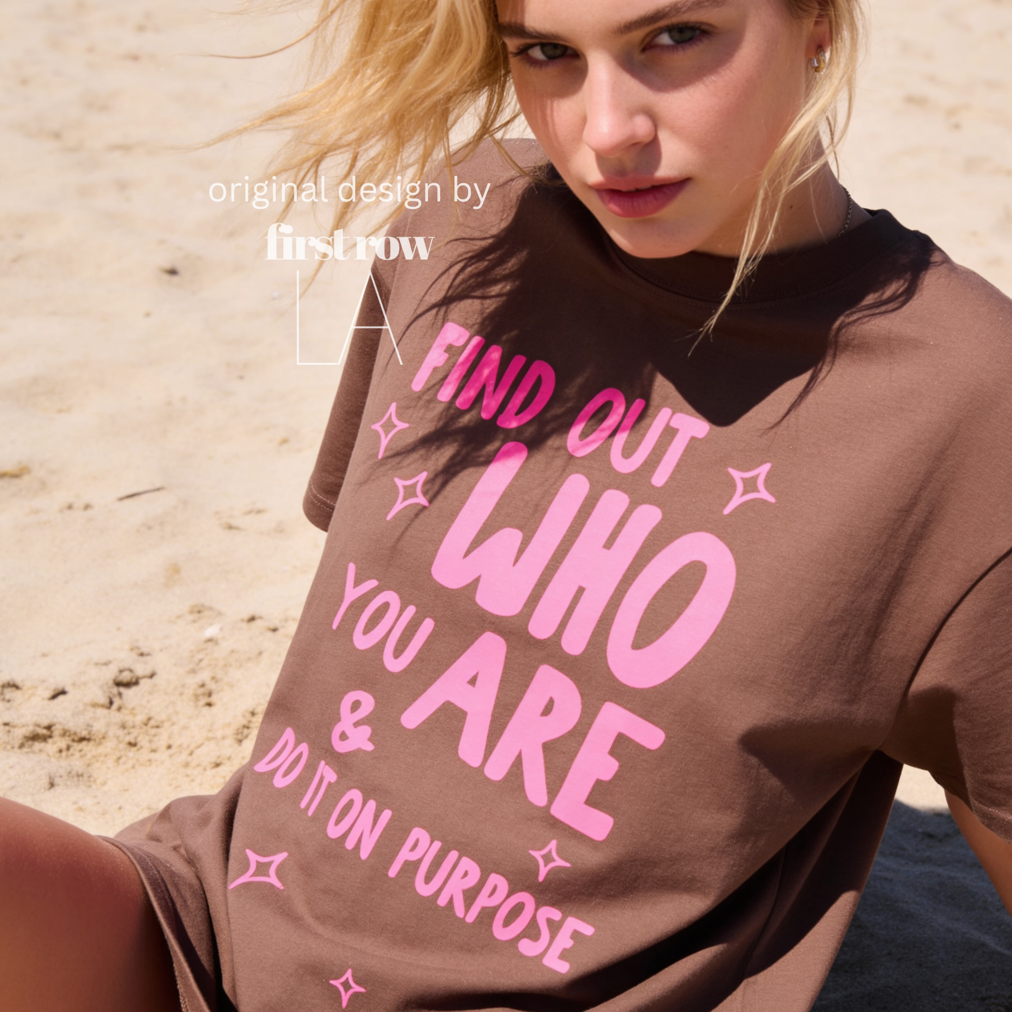 A woman wearing aT-shirt with bright pink text that reads 'FIND OUT WHO YOU ARE & DO IT ON PURPOSE'.

Original design and copyright by first row LA August 26th, 2026