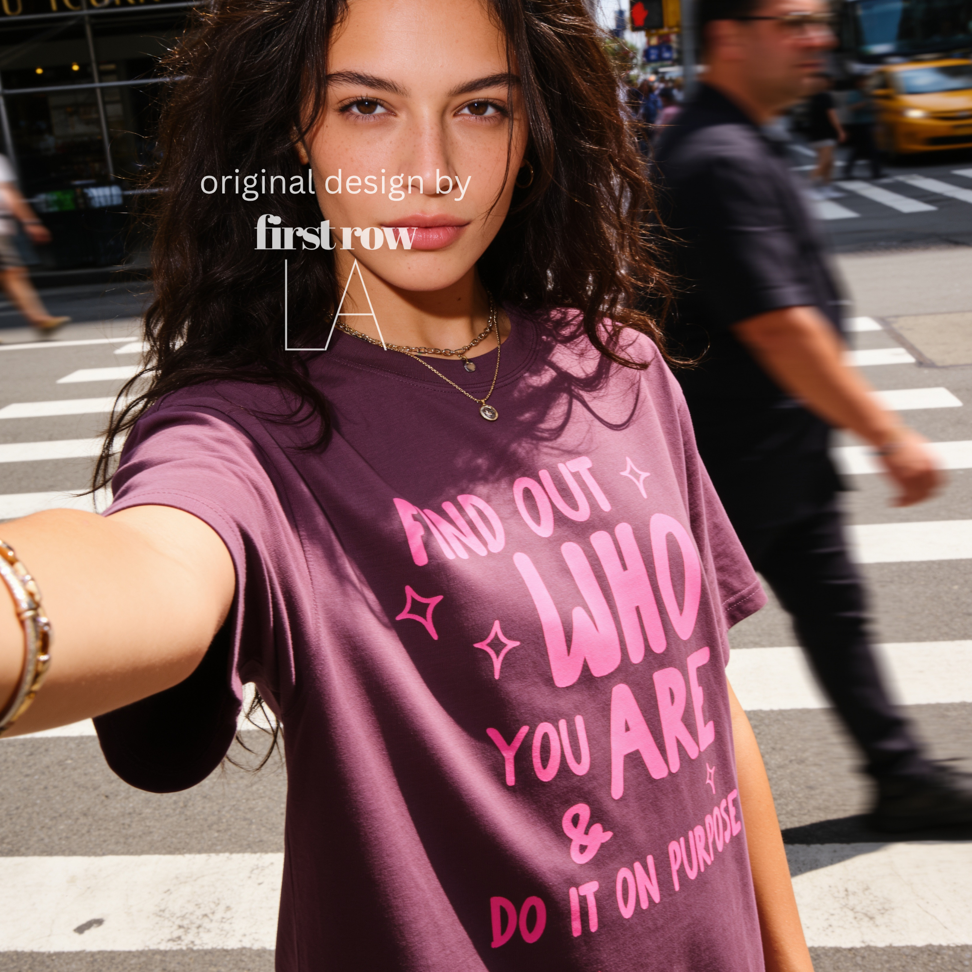 A woman wearing aT-shirt with bright pink text that reads 'FIND OUT WHO YOU ARE & DO IT ON PURPOSE'.

Original design and copyright by first row LA August 26th, 2026