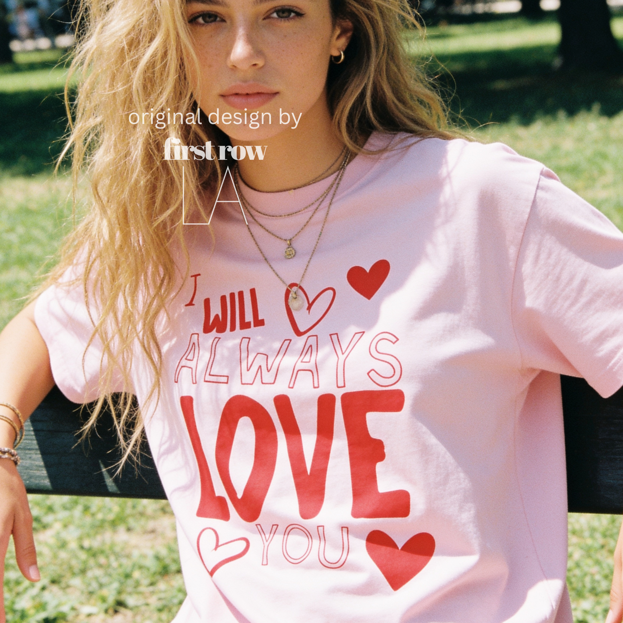 A woman wearing 'I will always love you' T-shirt. 

Original design and copyright by first row LA August 26th, 2026