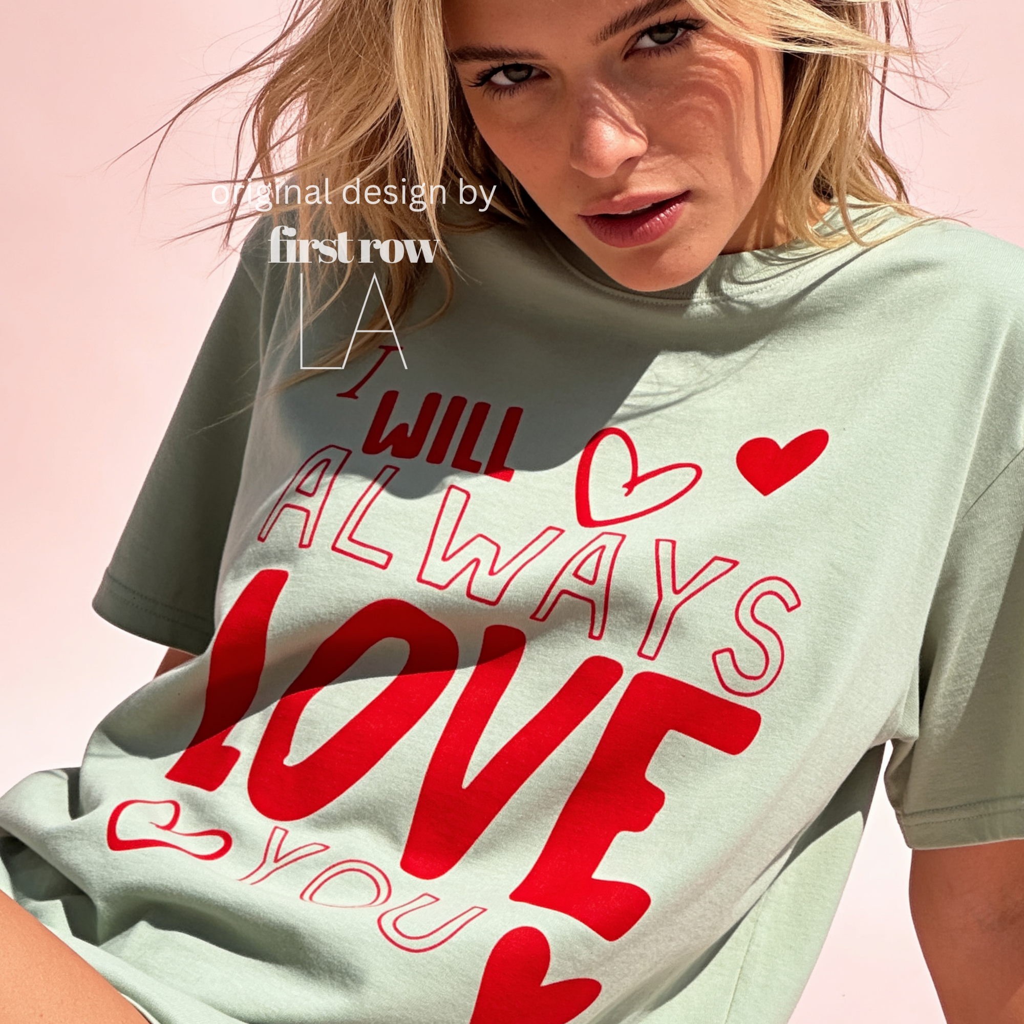 A woman wearing 'I will always love you' T-shirt. 

Original design and copyright by first row LA August 26th, 2026