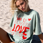 A woman wearing 'I will always love you' T-shirt. 

Original design and copyright by first row LA August 26th, 2026