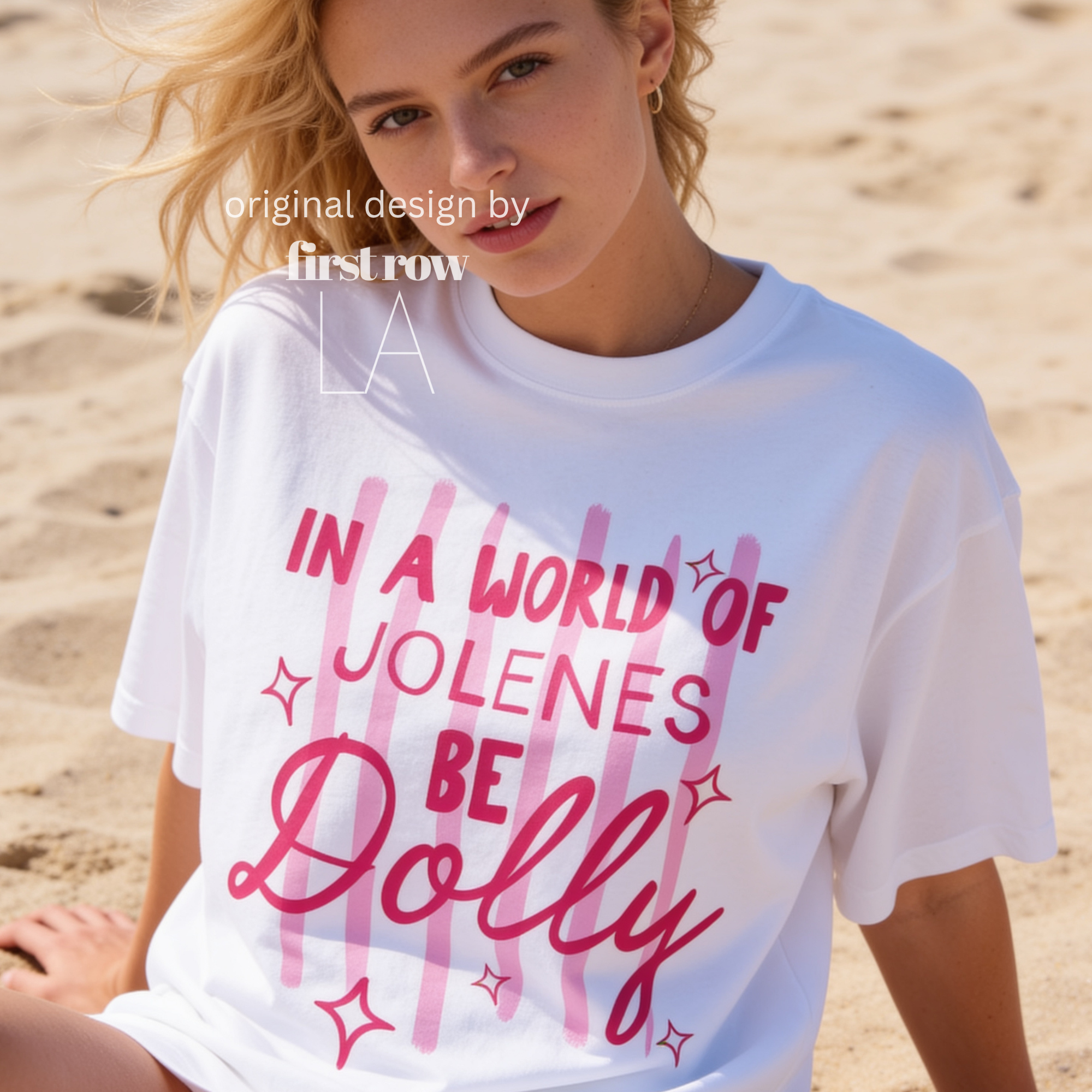 A woman wearing In a World of Jolenes Be Dolly T-shirt.

Original design and copyright by first row LA August 28th, 2026.
