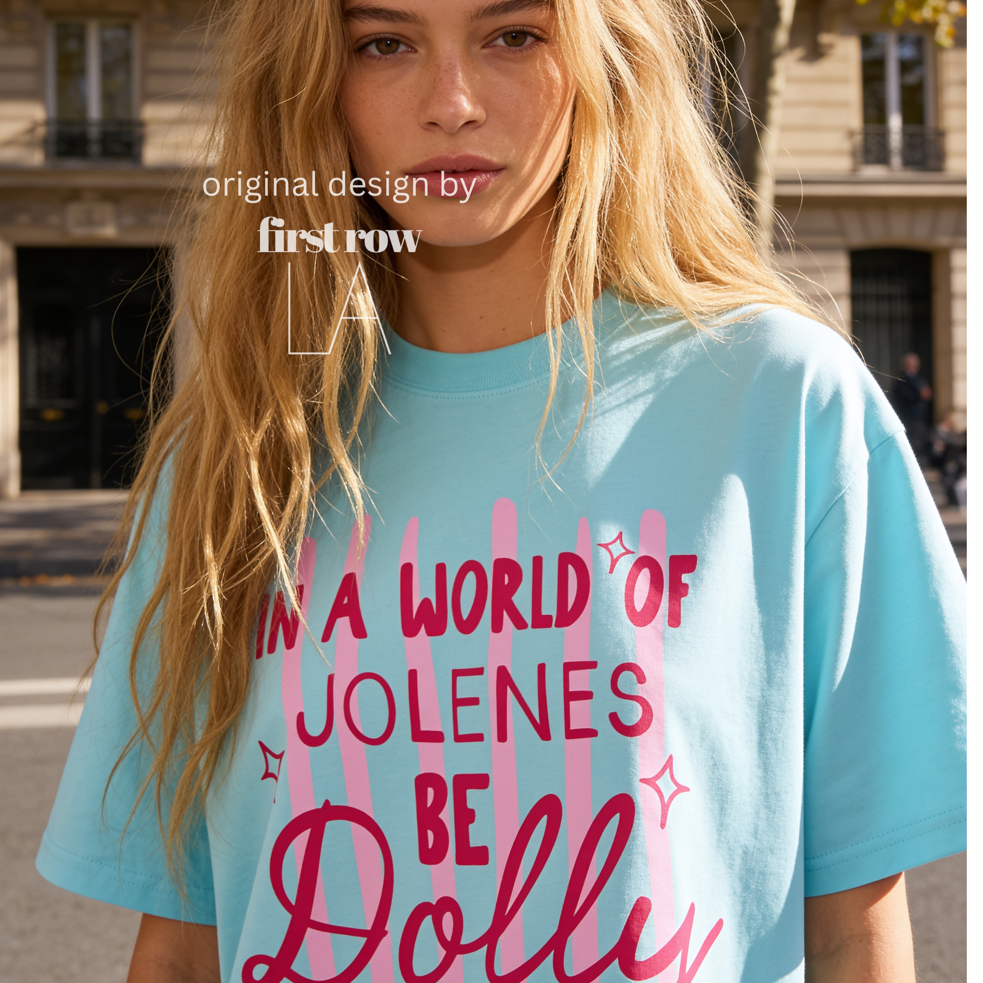 A woman wearing In a World of Jolenes Be Dolly T-shirt.

Original design and copyright by first row LA August 28th, 2026.