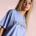 A woman wearing a T-shirt with 'Accepting OLD MONEY & Tequila' print.

Original design and copyright by first row LA 2024.
