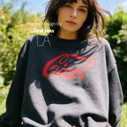 A woman outdoors wearing an oversized dark gray sweatshirt with a large red 'Ciao!' script graphic across the chest. 

Original design and copyright by first row LA.