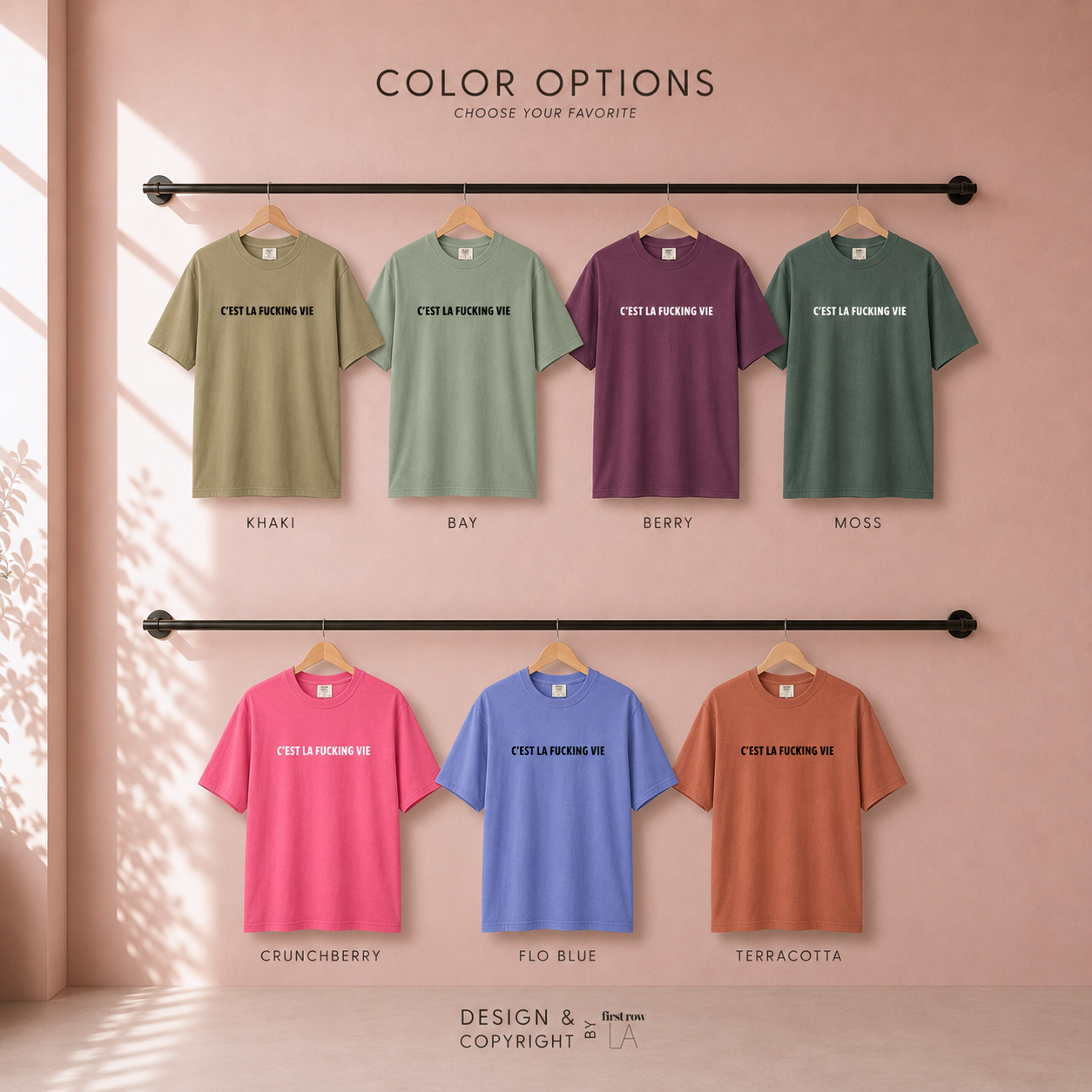 Color options for C'EST LA FUCKING VIE' T-shirt in khaki, bay, berry, moss, crunchberry, flo blue, and terracotta. Original design by first row LA