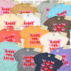 Color options for More AMOR POR FAVOR, pink heart T-shirt. 

Original design and copyright by first row LA 2026