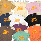 Color options for 'SANTA ROCKS' unisex funny Christmas T-shirt.

Original design and copyright by first row LA. 

The shirts include tan, cream, pink, navy, white, black, berry, espresso, island reef, and orange.