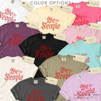 Color options for red distressed Gothic-style 'We the People' T-shirt. The shirts come in white, cream, pink, purple, black, light pink, mint, ivory, taupe, charcoal, and lavender.

Original design and copyright by first row LA 2026.