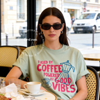 Woman wearing Fueled by Coffee Powered by Good Vibes Shirt, Coffee Club T-Shirt, Moka Pot T, Foodie Gift, Cozy Café Aesthetic Gift, Unisex Comfort Colors