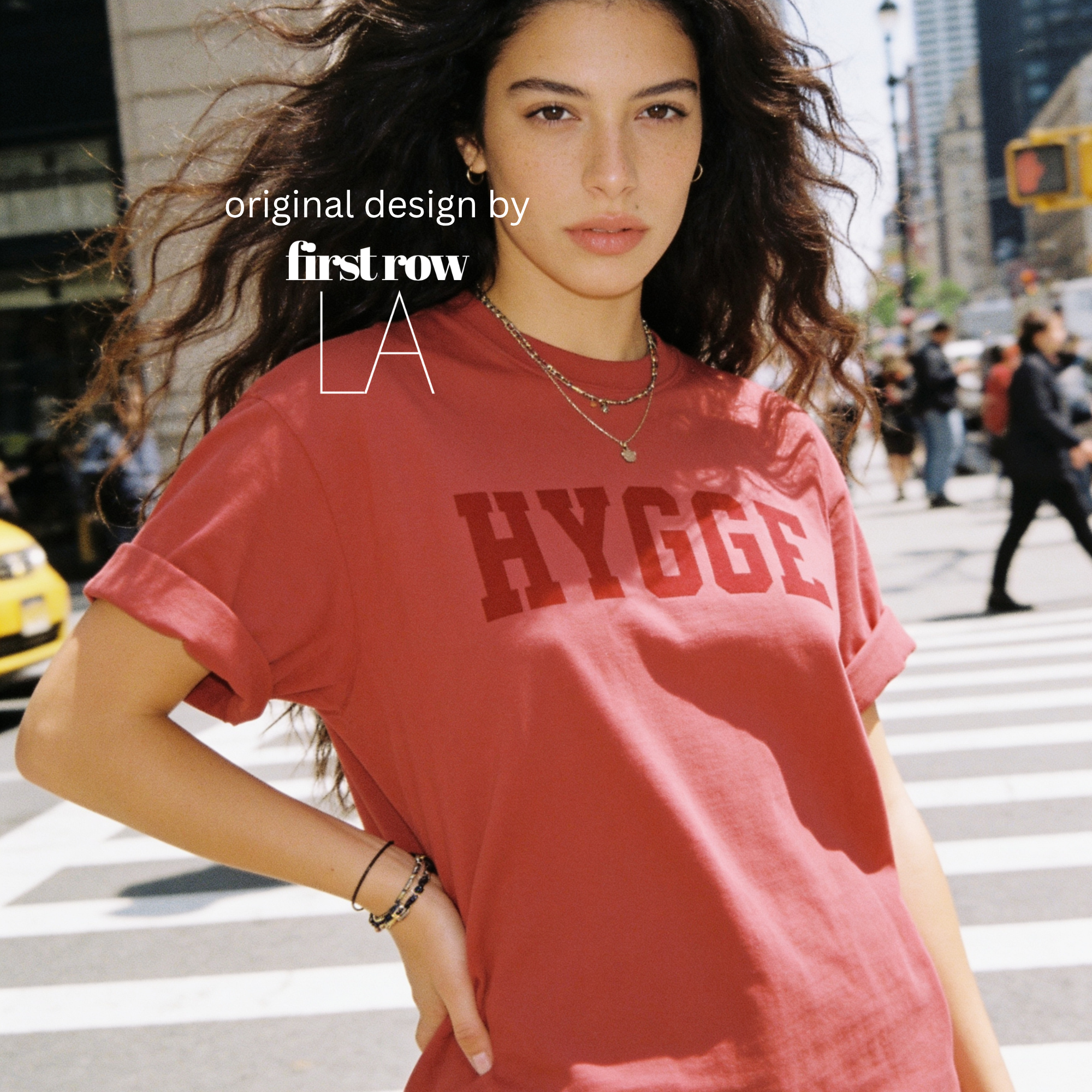 Woman wearing HYGGE T-shirt

Original design and copyright by first row LA 2025