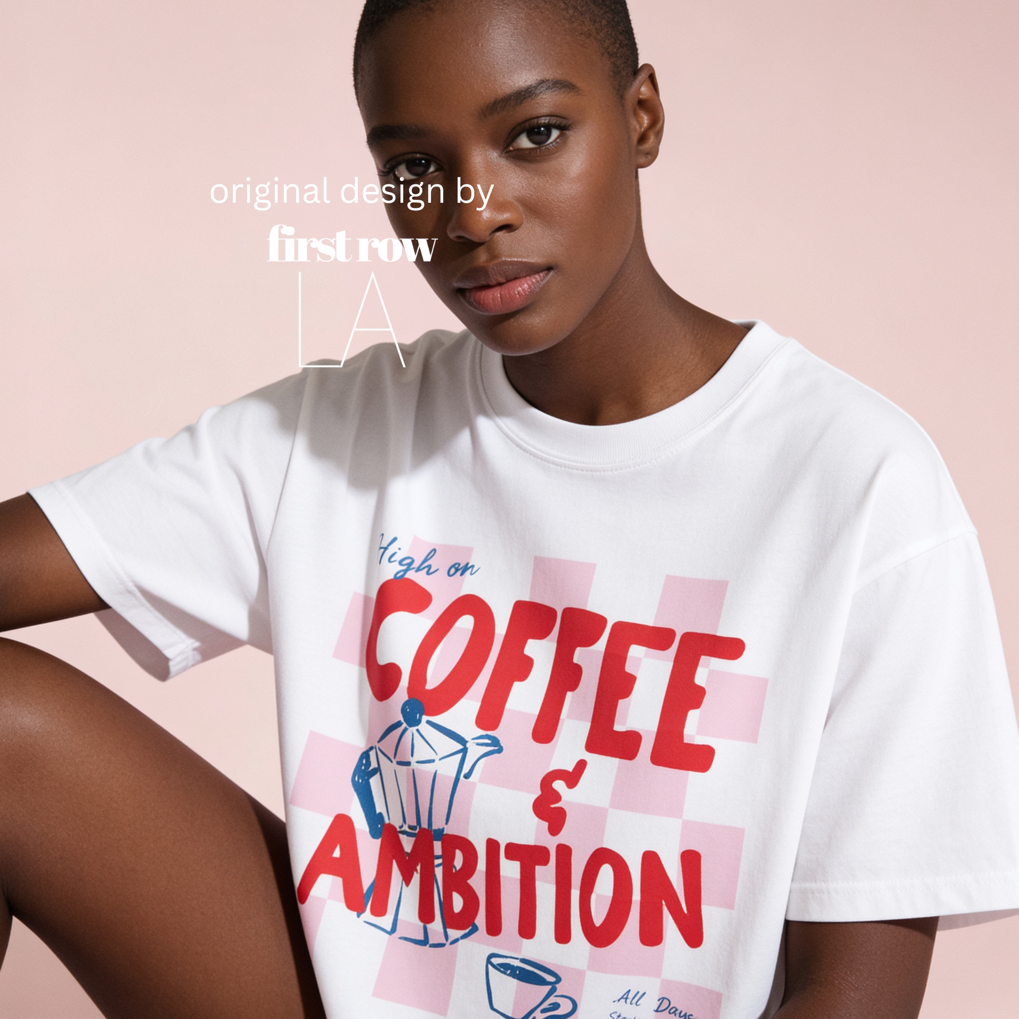 A model wearing a white graphic t-shirt with 'High onCOFFEE & AMBITION' printed in red and blue on a pink checkered background. Original design by first row LA.