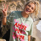 Woman wearing More Amor Por Favor Shirt, Summer Graphic Tee, Pink Heart T-Shirt, Cute Spanish Shirt, Retro Vacation Tee, Beach Lover Shirt, Love More Tee