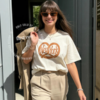 Woman wearing NYC Pretzel T-Shirt, New York Street Food Tee, Distressed Graphic Shirt, Unisex Travel Tee, Funny Foodie Gift, Unisex Big Apple Shirt
