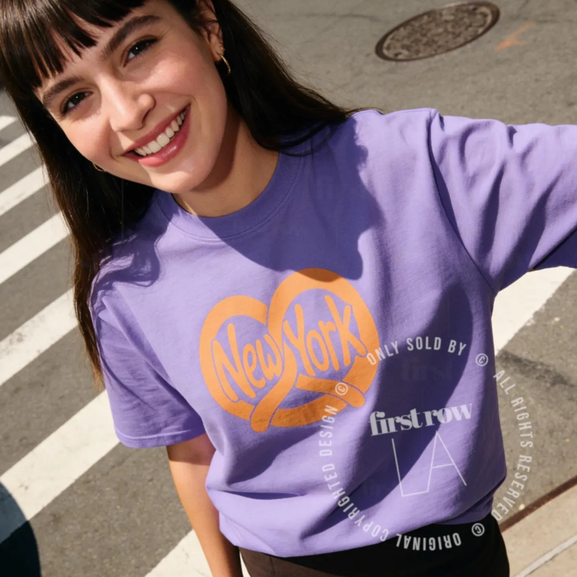 Woman wearing NYC Pretzel T-Shirt, New York Street Food Tee, Distressed Graphic Shirt, Unisex Travel Tee, Funny Foodie Gift, Unisex Big Apple Shirt