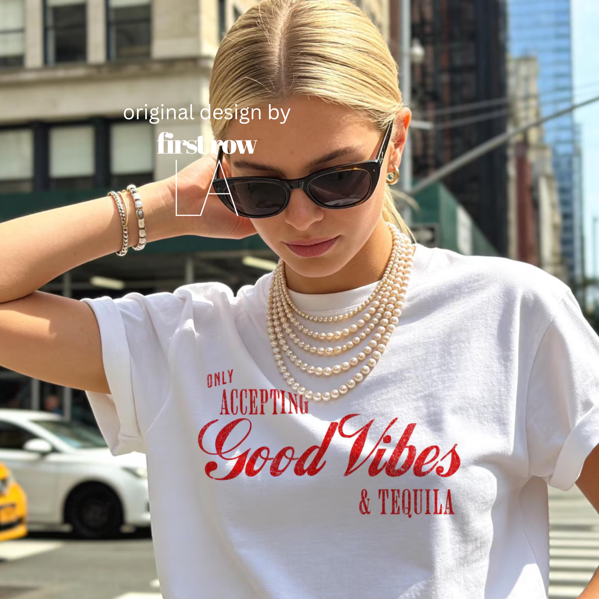 Woman wearing 'Only Accepting Good Vibes & Tequila' T-shirt.

Original design and copyright by first row LA.