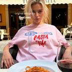 Woman wearing spaghetti on a fork in blue and the words 'PASTA is life' in red. 

Original design and copyright by first row LA 2025.