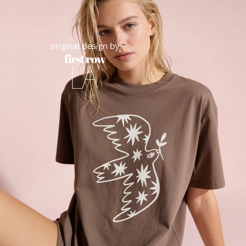 Woman wearing peace dove T-shirt.

Original design by first row LA.