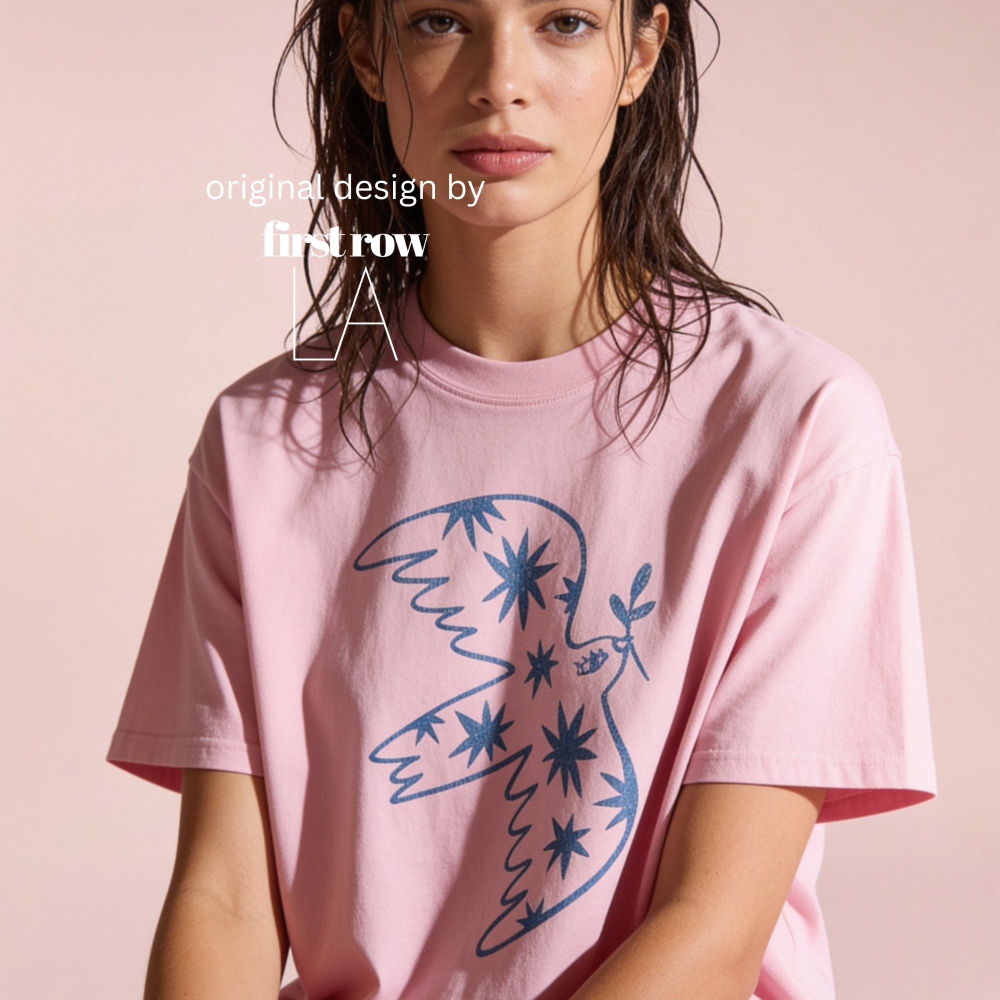 Woman wearing peace dove T-shirt.

Original design by first row LA.
