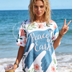 Woman wearing Peace On Earth All Over Print Shirt, Dove & Floral Graphic Tee, Full Print Spiritual Shirt, Hope Aesthetic Festival Te
