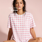 A woman wearing a white short-sleeve t-shirt with a pink lip and dotted print pattern.

Original design and copyright by first row A.