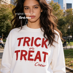 Woman wearing unisex sweatshirt with the text Trick or Treat Crew.

Original design and copyright by first row LA.