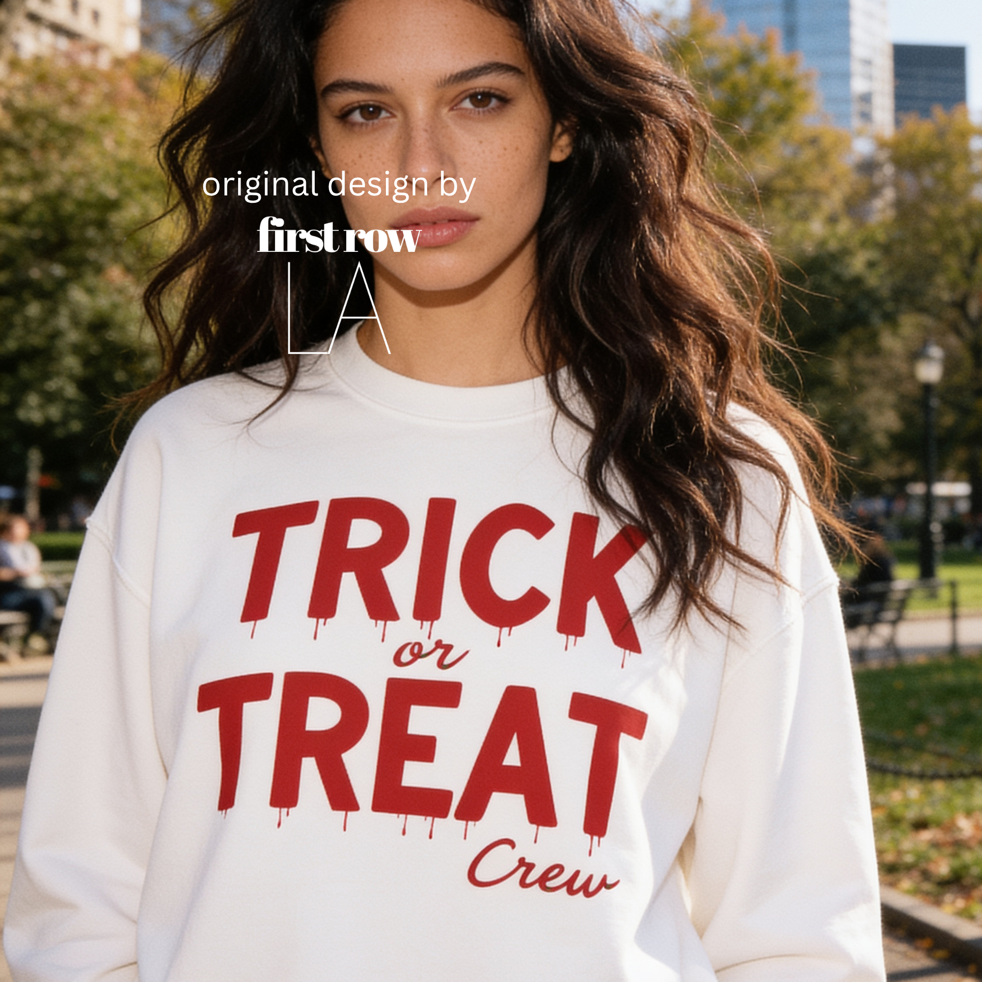 Woman wearing unisex sweatshirt with the text Trick or Treat Crew.

Original design and copyright by first row LA.