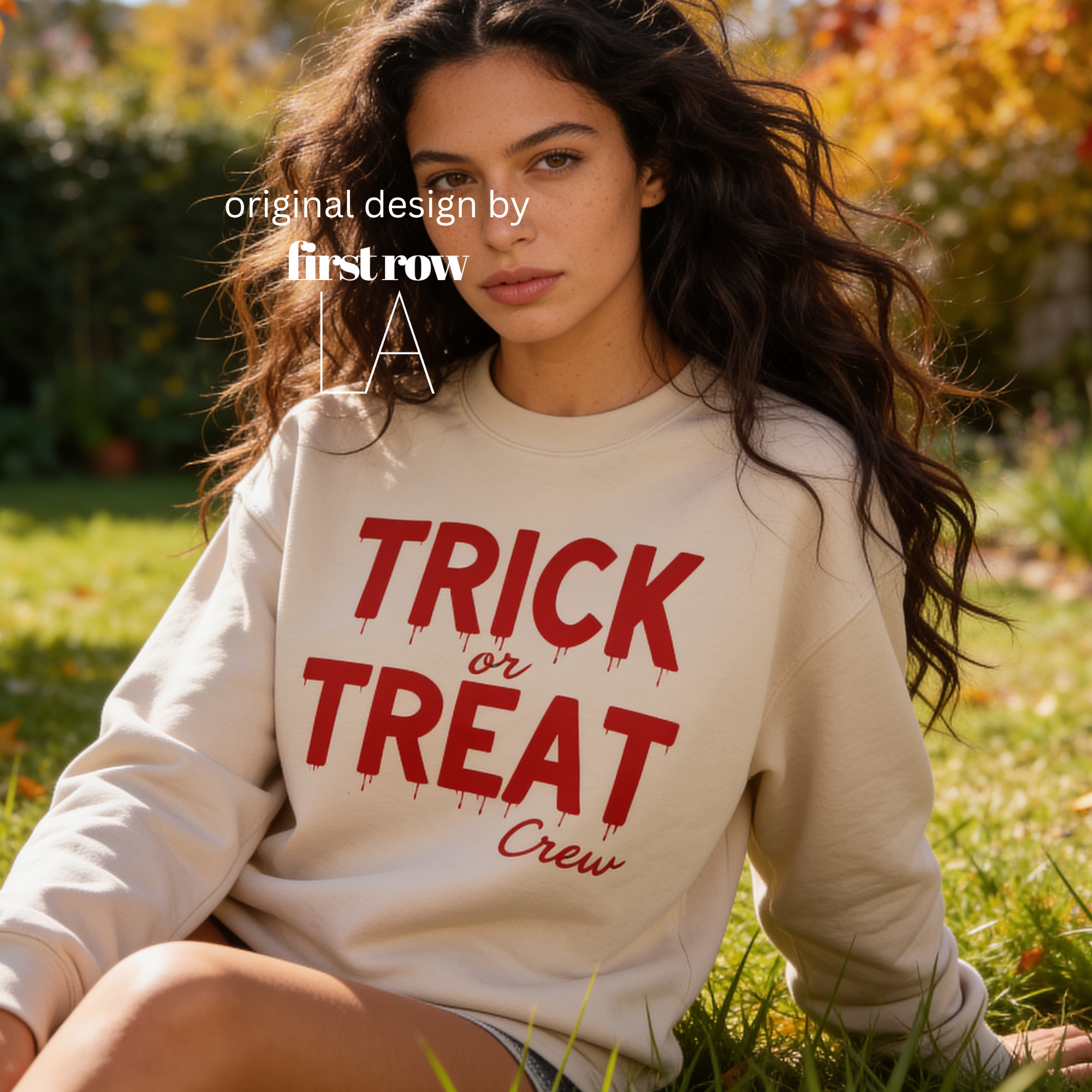 Woman wearing unisex sweatshirt with the text Trick or Treat Crew.

Original design and copyright by first row LA.