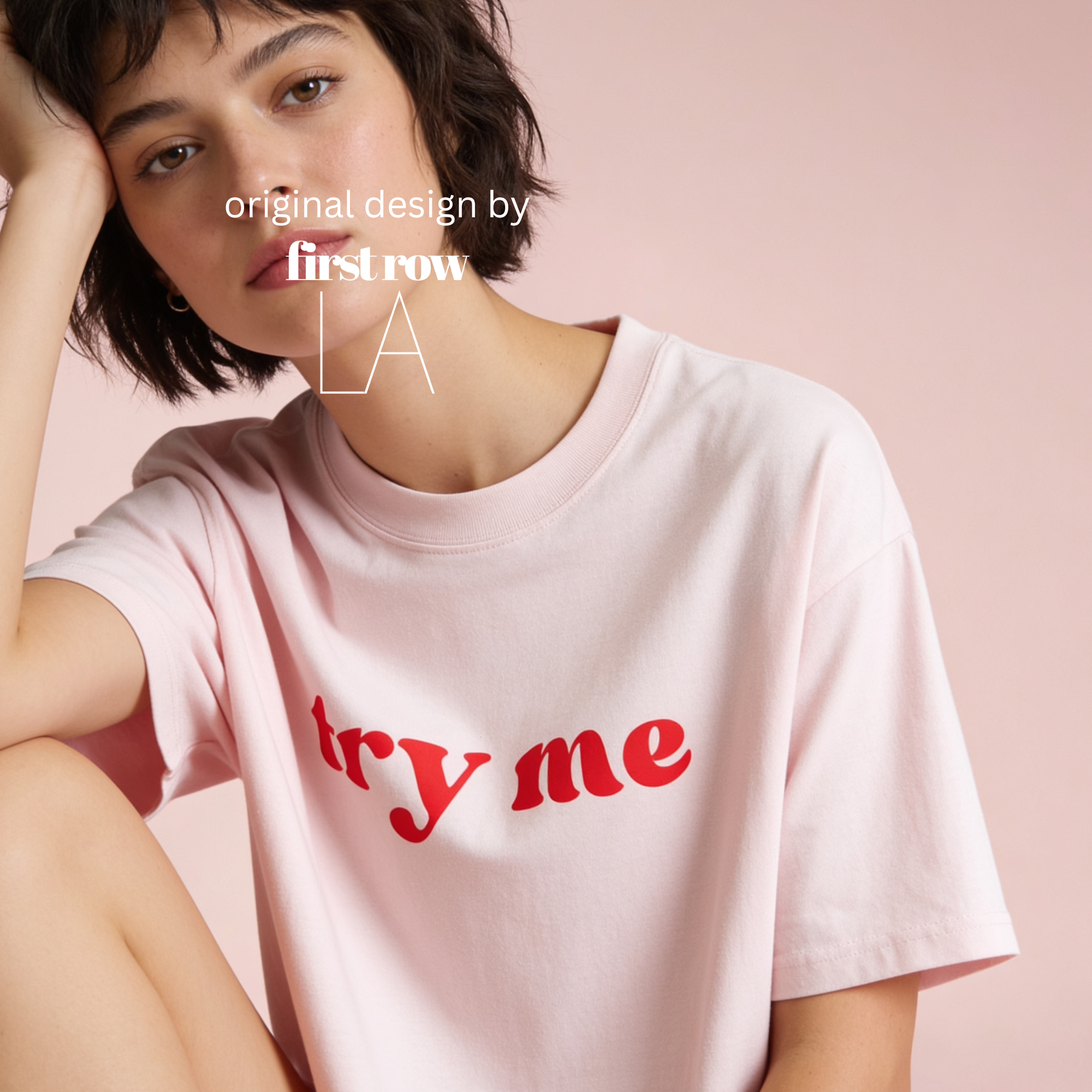 Woman wearing 'try me' T-shirt.

Original design and copyright by first row LA.
