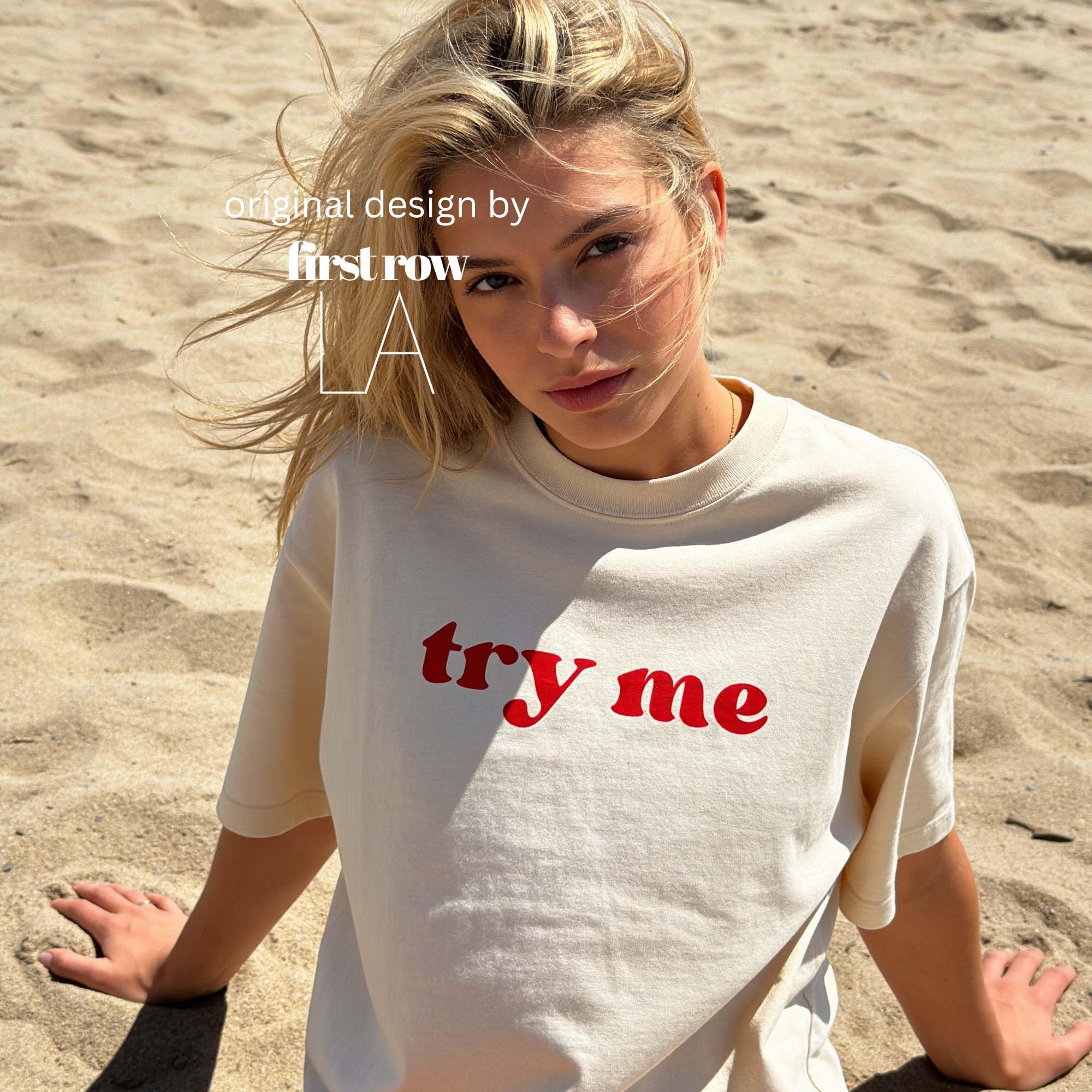 Woman wearing 'try me' T-shirt.

Original design and copyright by first row LA.